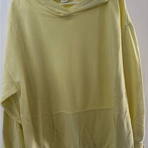 GAP yellow hoodie in XL. Thinner material for late summer/early fall weather.